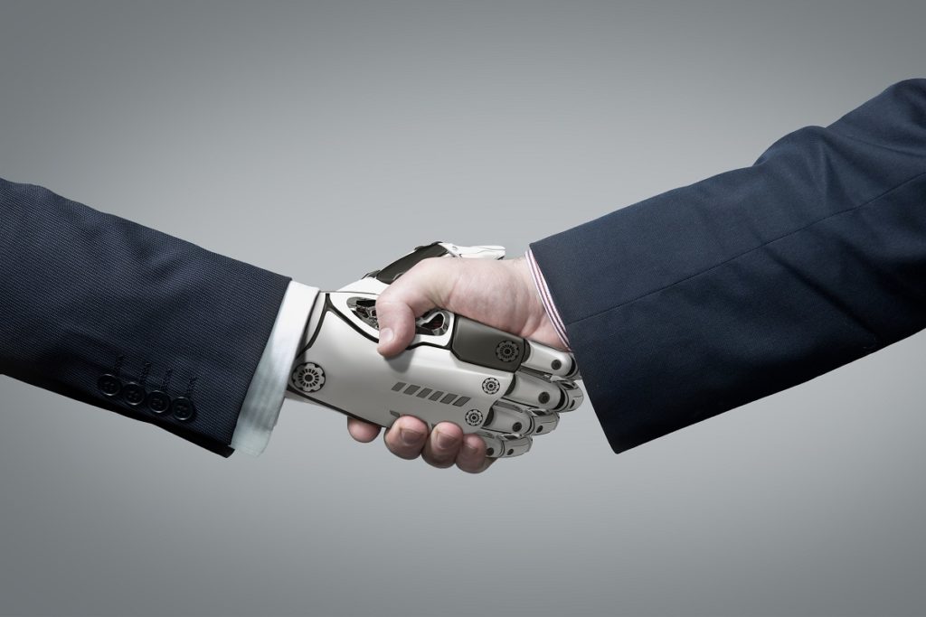 robot and man handshake