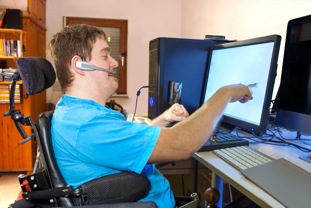 Disabled person working with computer